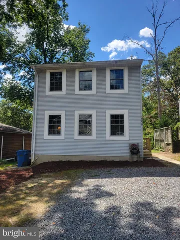 a view of a house with a garden