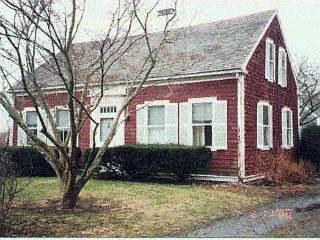 Undisclosed Address West Barnstable, MA 02668 - Photo 2 of 2 a front view of a house with garden