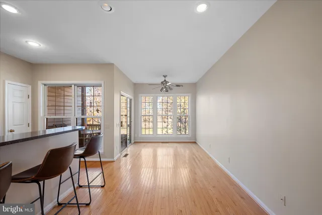 a bathroom with a sink and cabinets