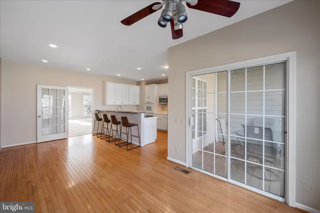 a kitchen with a sink and a stove top oven