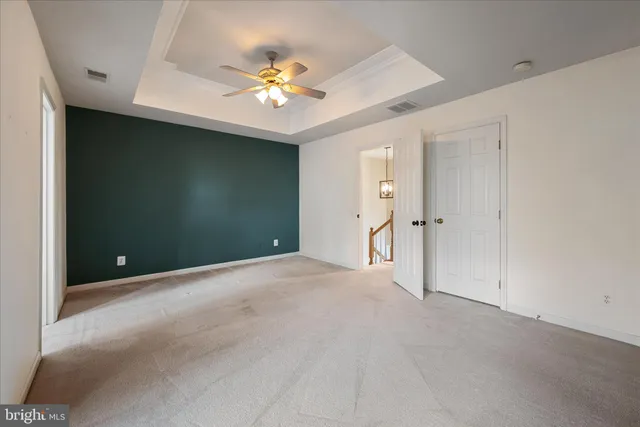 a bathroom with a sink a mirror and a shower