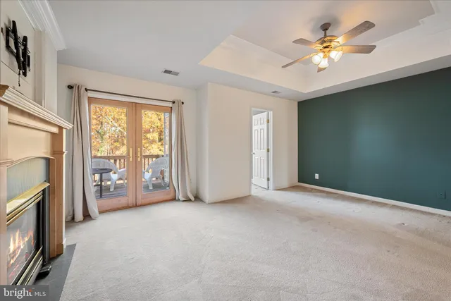 a view of a chair and table in the balcony