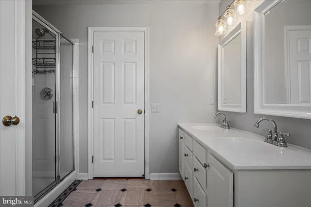 a view of a house with a yard and furniture