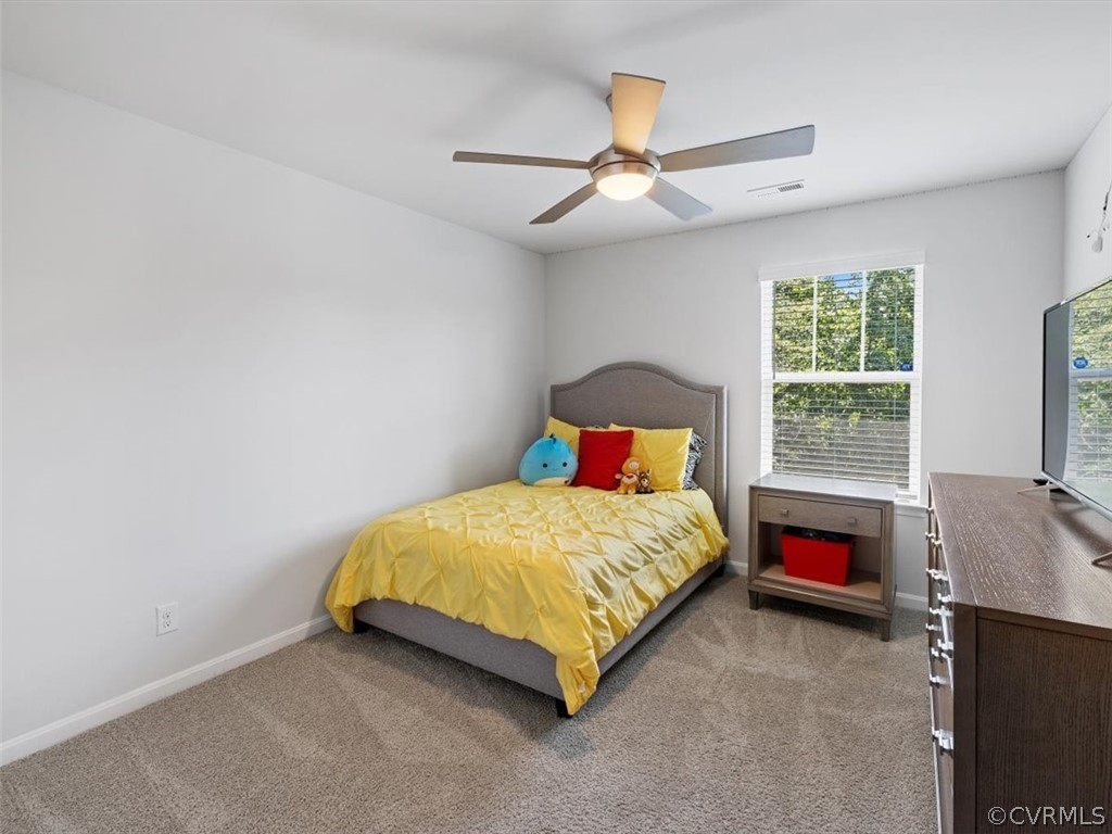 1413 Braisden Road Midlothian, VA 23114 - Photo 26 of 37 a bedroom with a bed and window