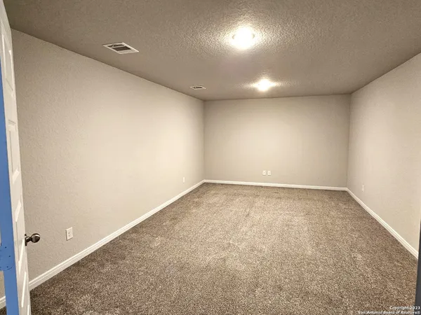 an empty room with a natural light