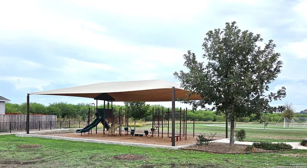 a view of a park with slide