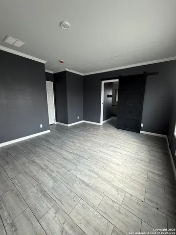 a spacious bathroom with a double vanity sink a large mirror a shower and a bathtub