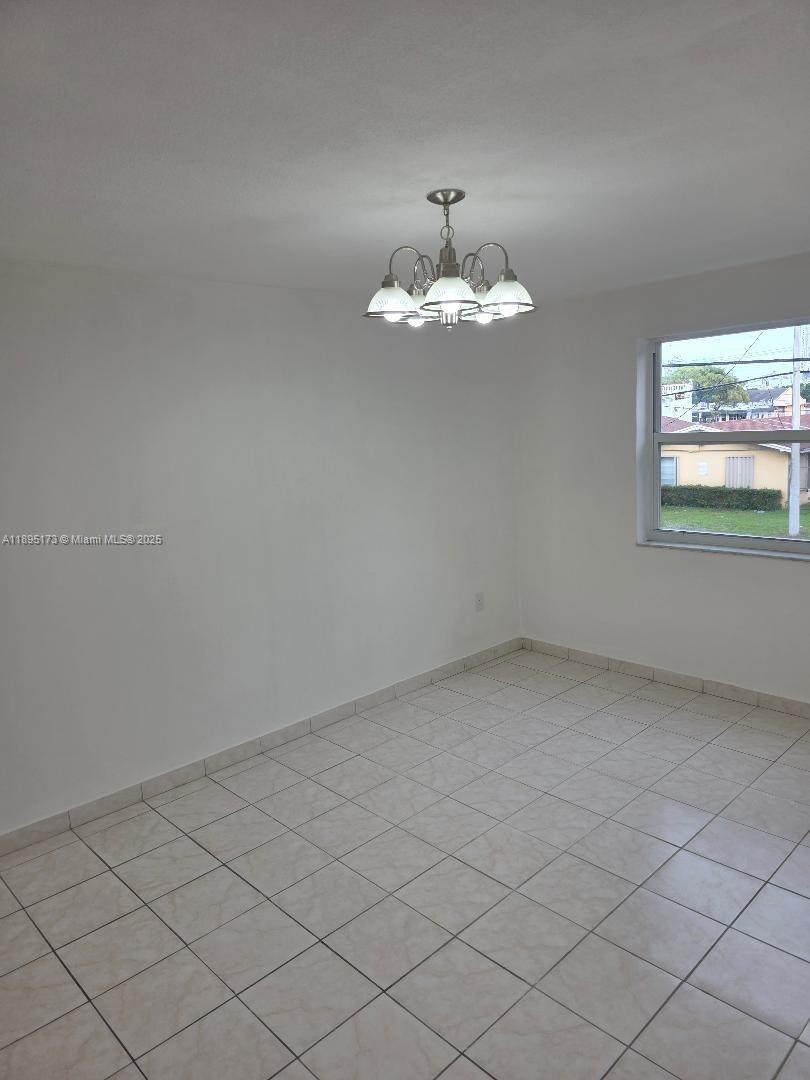 677 Southwest 9th Avenue, Unit 205 Miami, FL 33130 - Photo 15 of 27 an empty room with a window