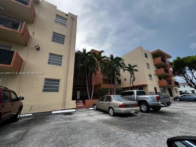 677 Southwest 9th Avenue, Unit 205 Miami, FL 33130 - Photo 2 of 27 a view of street with parked cars