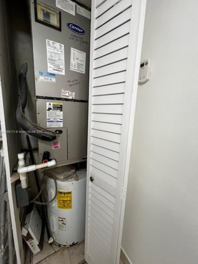 677 Southwest 9th Avenue, Unit 205 Miami, FL 33130 - Photo 6 of 27 a bathroom with a sink and a mirror