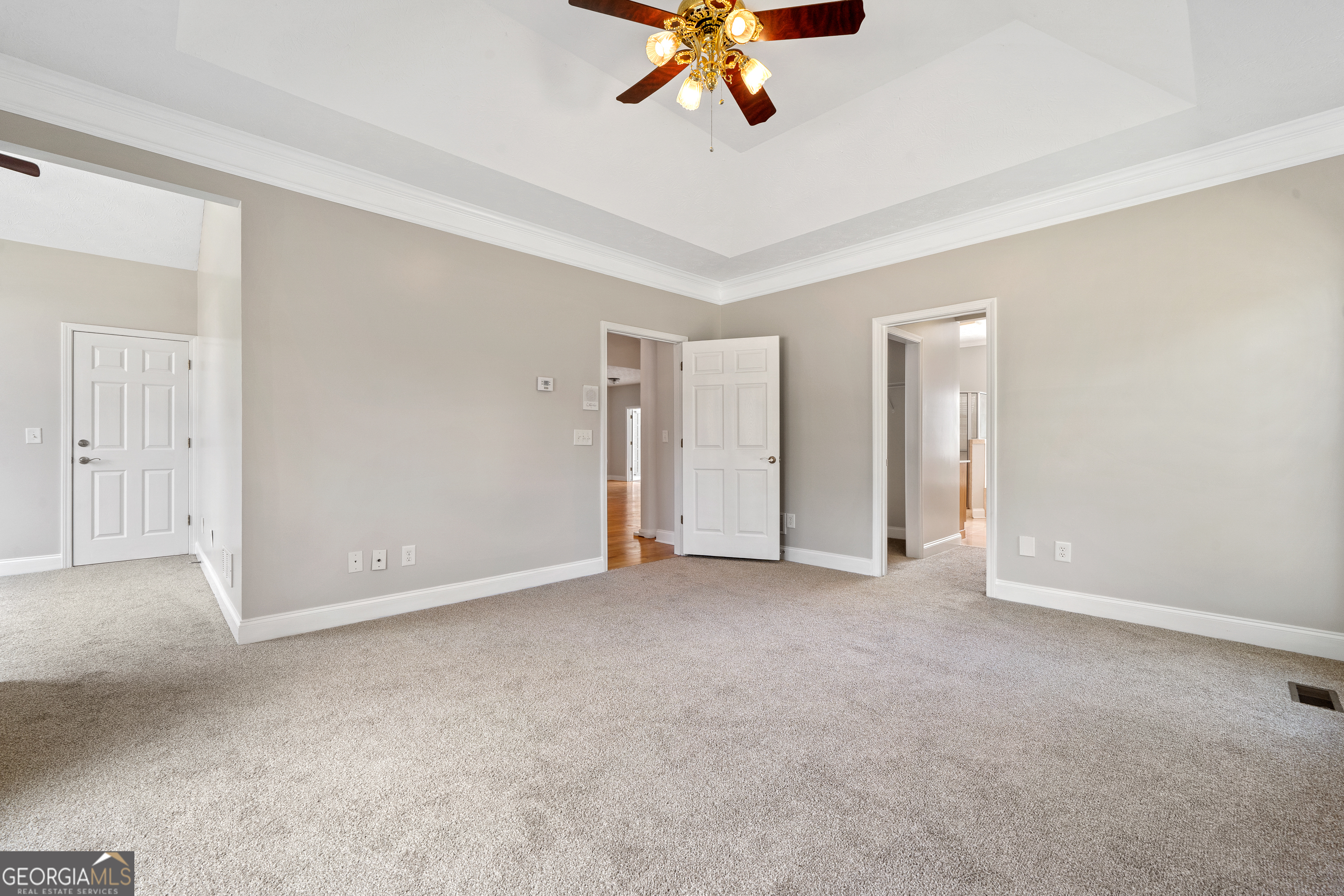 1041 Holstein Road Buckhead, GA 30625 - Photo 19 of 49 a view of an empty room with a ceiling fan