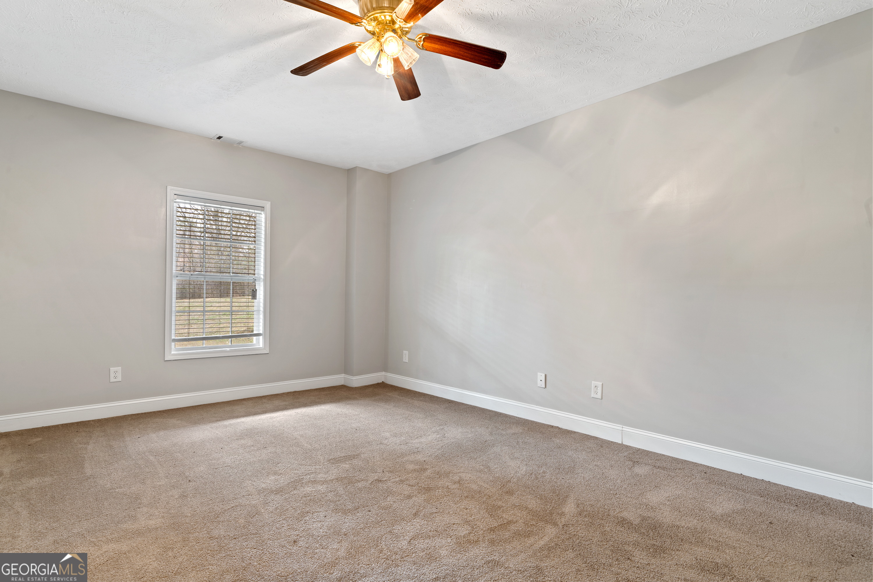 1041 Holstein Road Buckhead, GA 30625 - Photo 45 of 49 a view of an empty room with a window