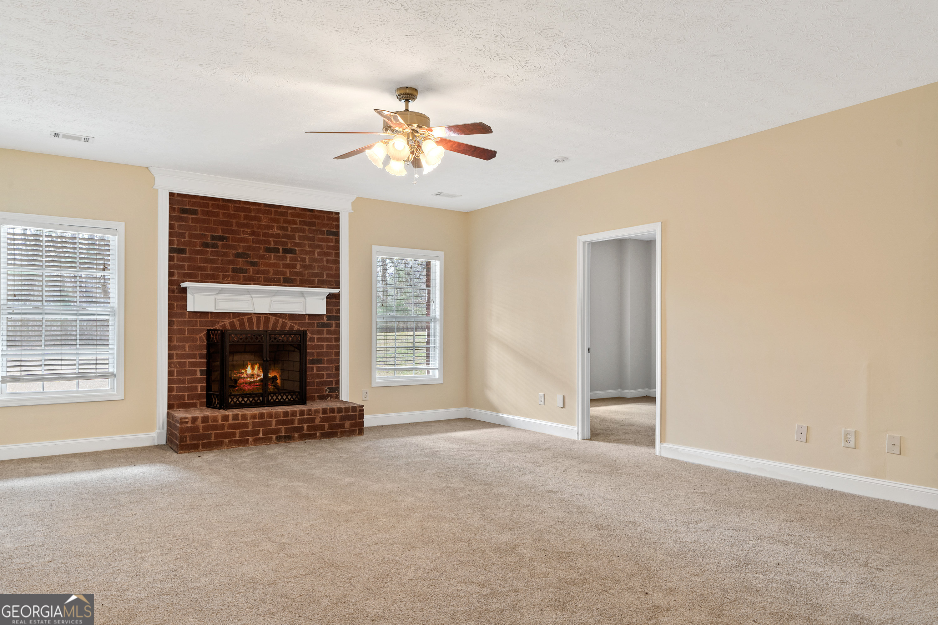 1041 Holstein Road Buckhead, GA 30625 - Photo 46 of 49 a view of an empty room with a fireplace