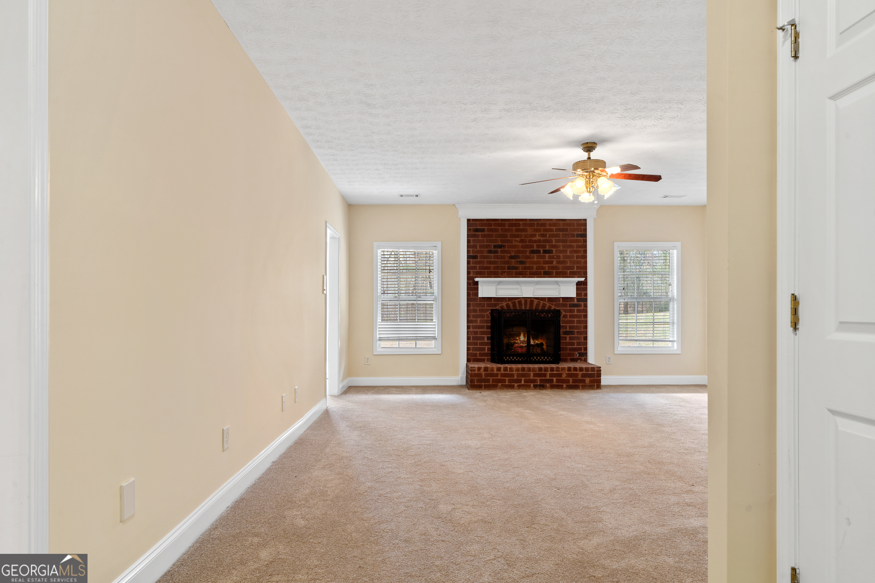 1041 Holstein Road Buckhead, GA 30625 - Photo 47 of 49 a view of an empty room with a fireplace