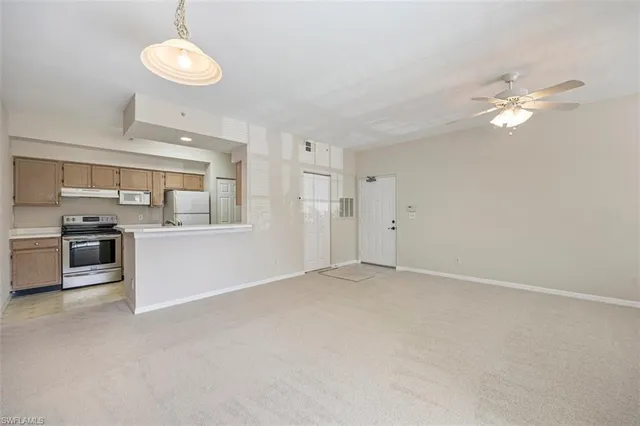 a view of a kitchen with a sink and dishwasher a kitchen view