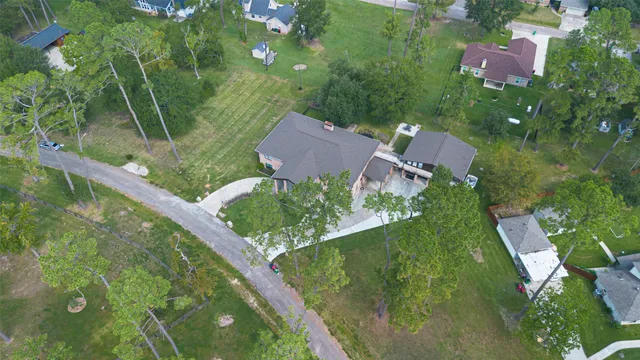 a view of a lake with houses in the back