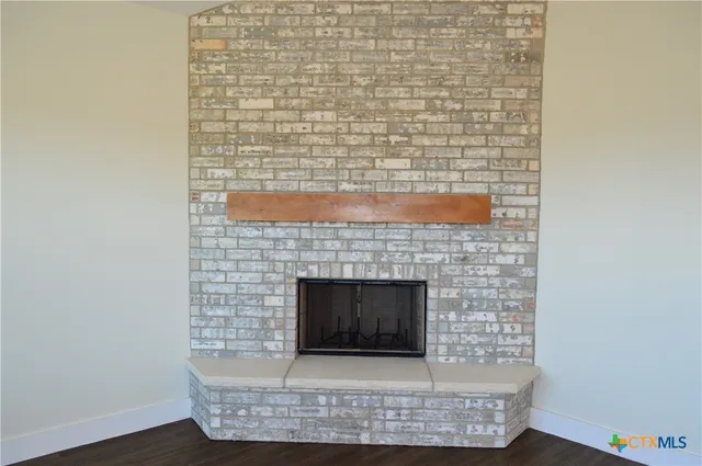 a room with a fireplace