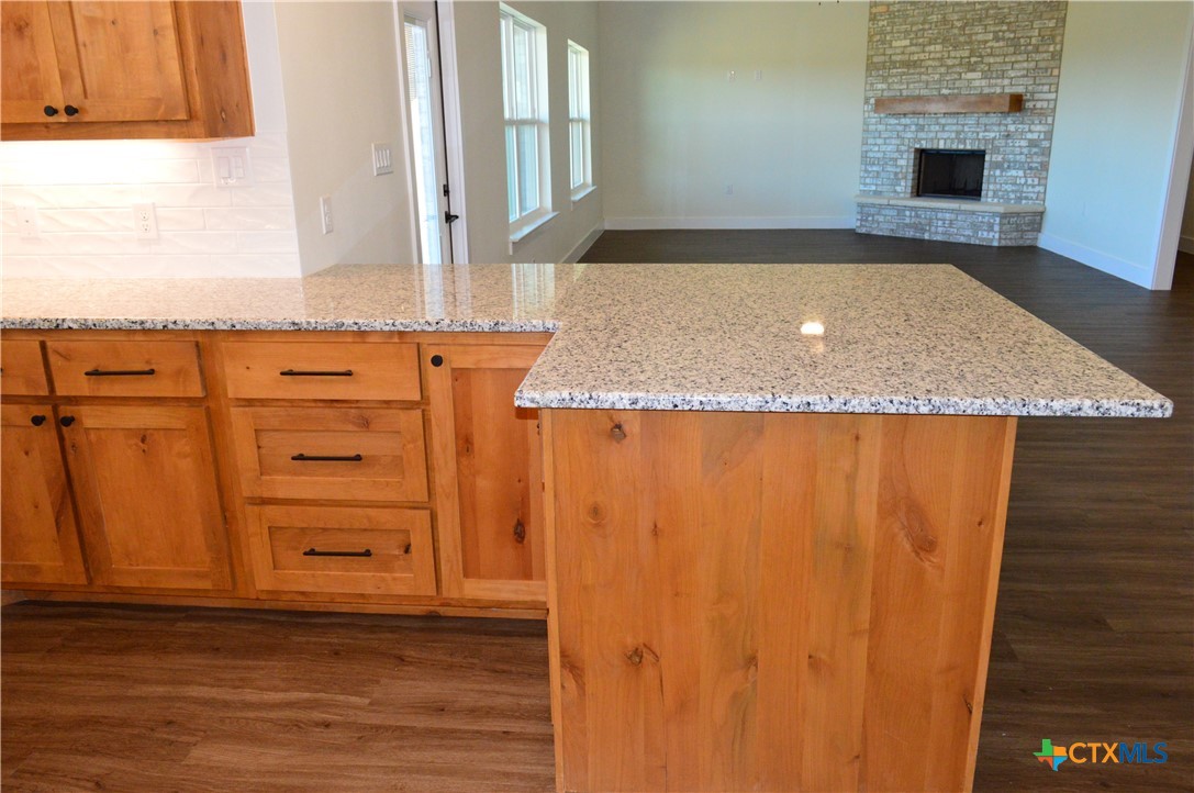 425 County Road 3152 Kempner, TX 76539 - Photo 16 of 48 an empty room with wooden floor