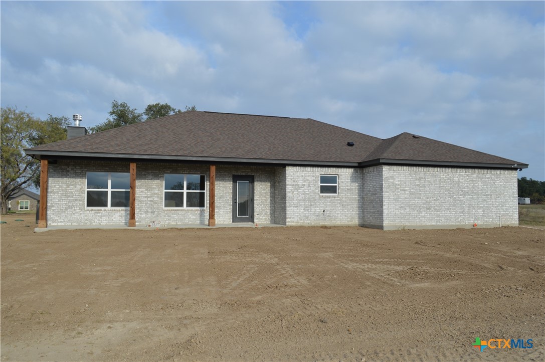 425 County Road 3152 Kempner, TX 76539 - Photo 40 of 48 a front view of a house with a yard and garage