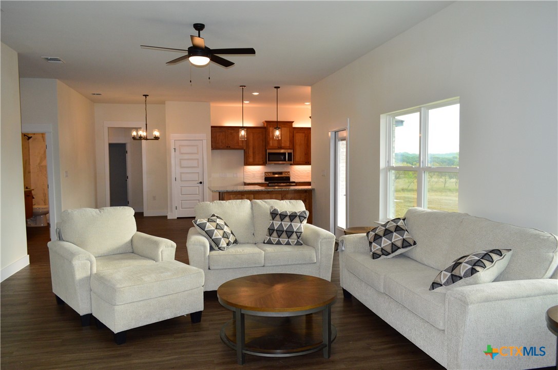 425 County Road 3152 Kempner, TX 76539 - Photo 10 of 48 a living room with furniture and a large window