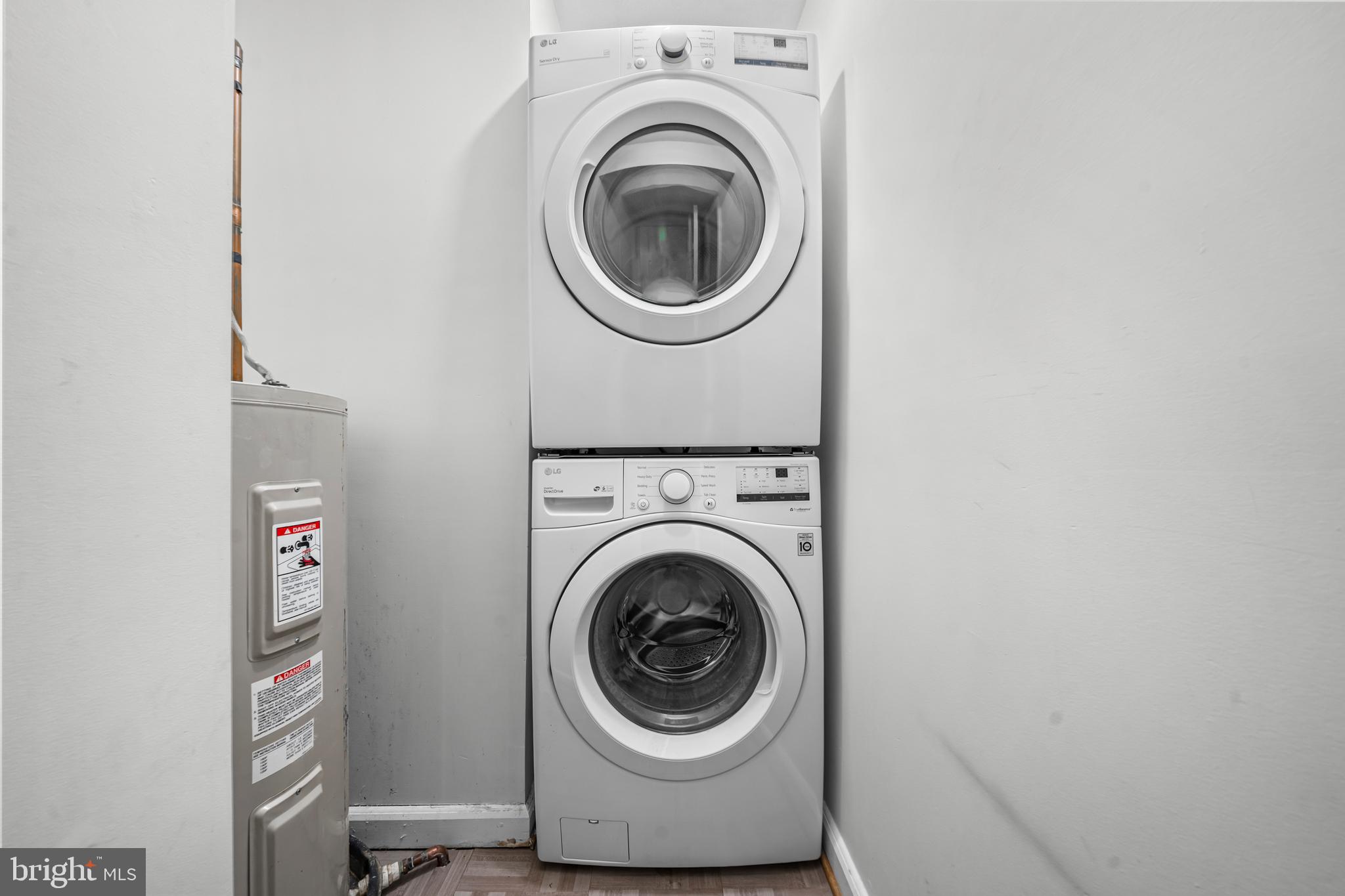 3861 Porter Street Northwest, Unit C285 Washington, DC 20016 - Photo 18 of 23 a close up view of a washer and dryer