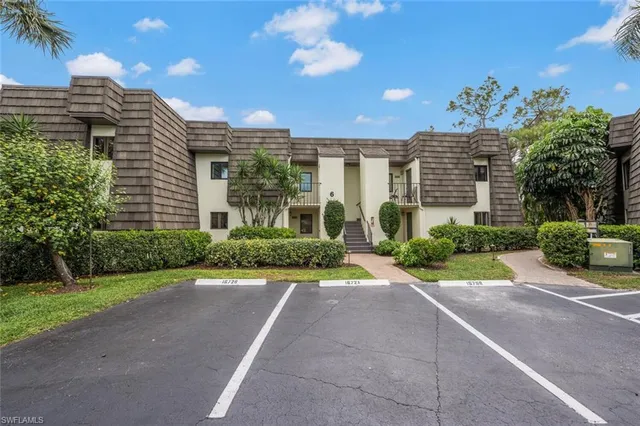 a view of a building with a garden