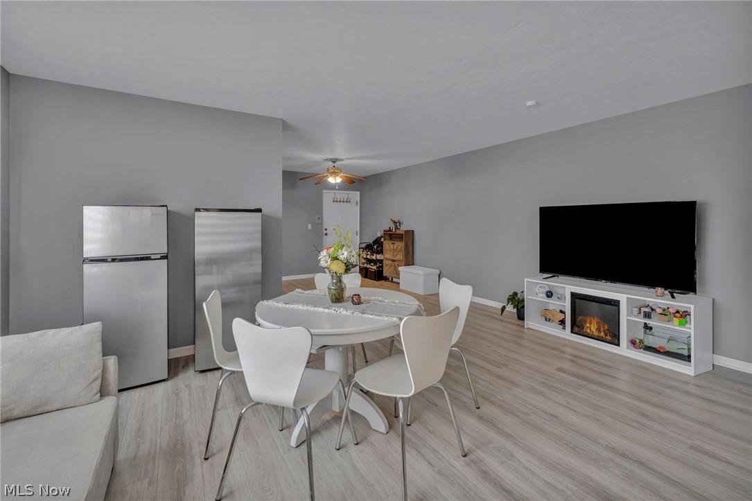 5200 Royalton Road, Unit 9B North Royalton, OH 44133 - Photo 6 of 27 Dining area with light wood finished floors and a ceiling fan