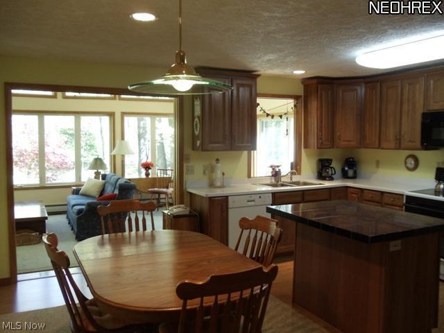 6533 Taylor Road Painesville, OH 44077 - Photo 12 of 25 KITCHEN HAS ROOM FOR YOUR LARGEST TABLE FOR ALL THOSE FAMILY FUNCTIONS.