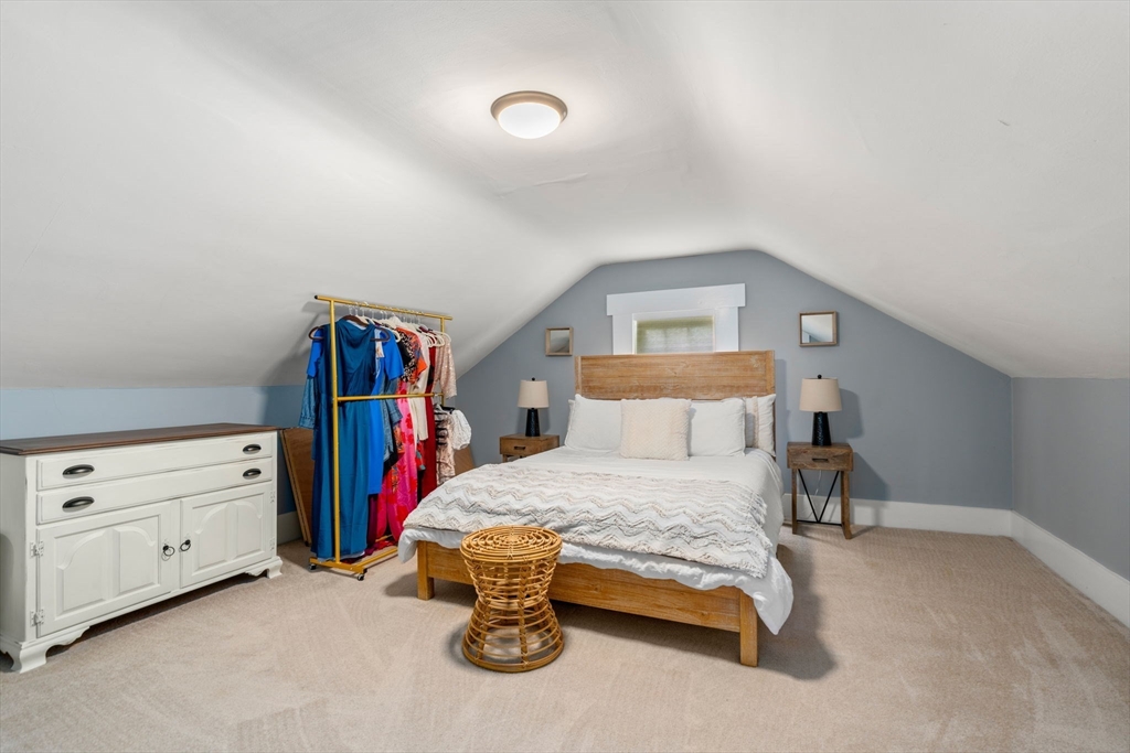 27 Champa Street, Unit 2 Newton, MA 02464 - Photo 12 of 16 a bedroom with a bed and a closet