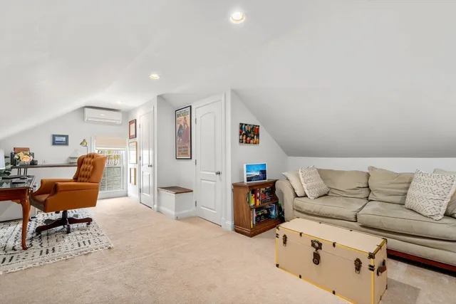 a living room with furniture and a couch