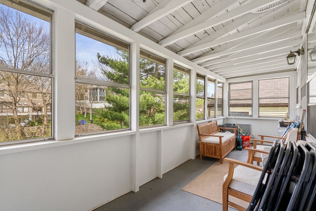 27 Champa Street, Unit 2 Newton, MA 02464 - Photo 15 of 16 a living room with furniture and a large window