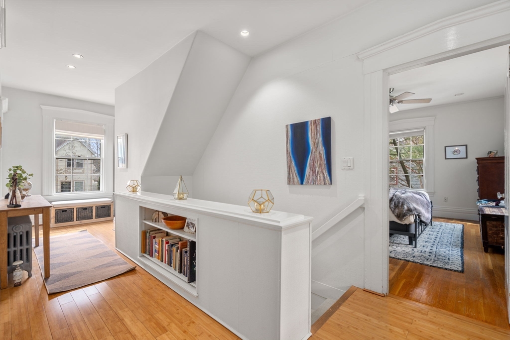27 Champa Street, Unit 2 Newton, MA 02464 - Photo 3 of 16 a living room with furniture and a wooden floor