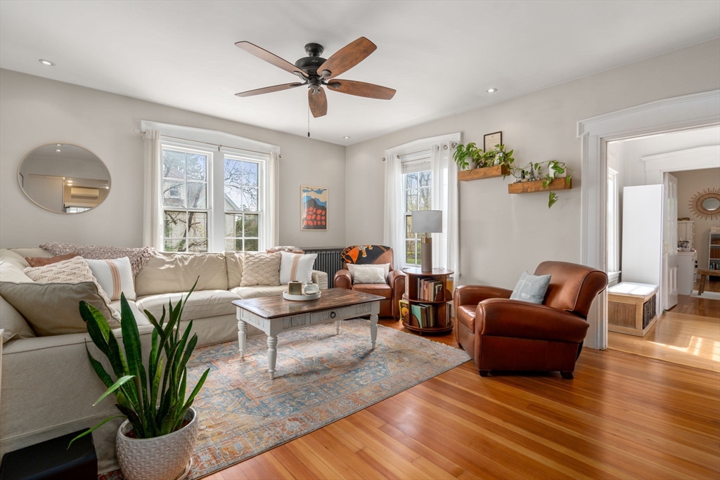 27 Champa Street, Unit 2 Newton, MA 02464 - Photo 8 of 16 a living room with furniture and wooden floor