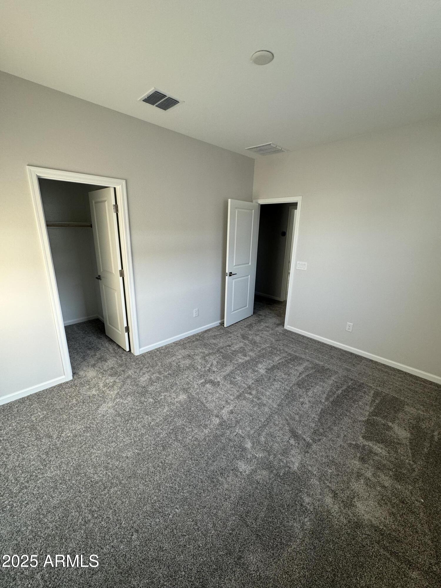 2737 East Boulder Avenue Apache Junction, AZ 85119 - Photo 7 of 22 a view of an empty room and closet