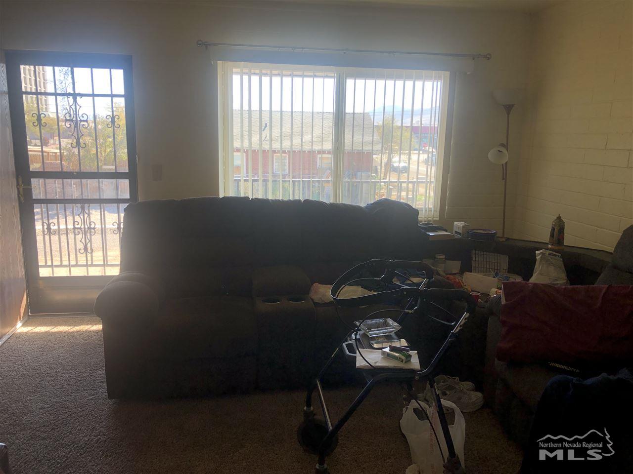 642 Spokane Street Reno, NV 89512 - Photo 14 of 16 a living room with furniture and a window