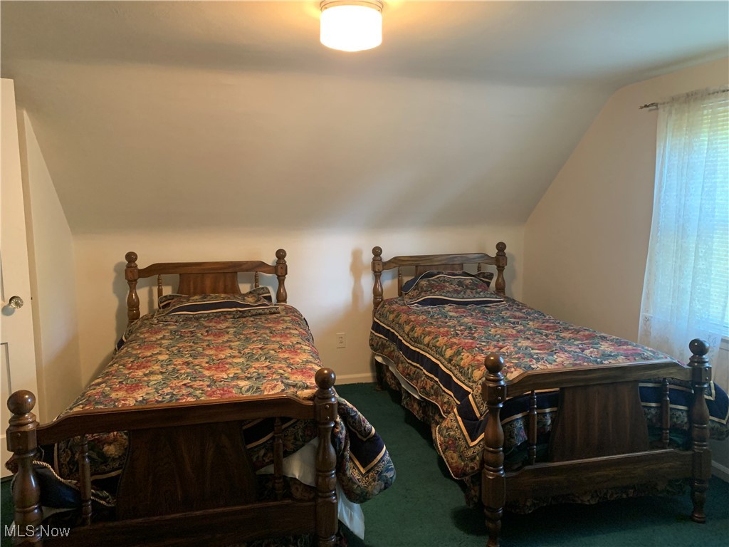 16879 Ridgeview Drive East Liverpool, OH 43920 - Photo 16 of 22 Bedroom featuring carpet floors and vaulted ceiling