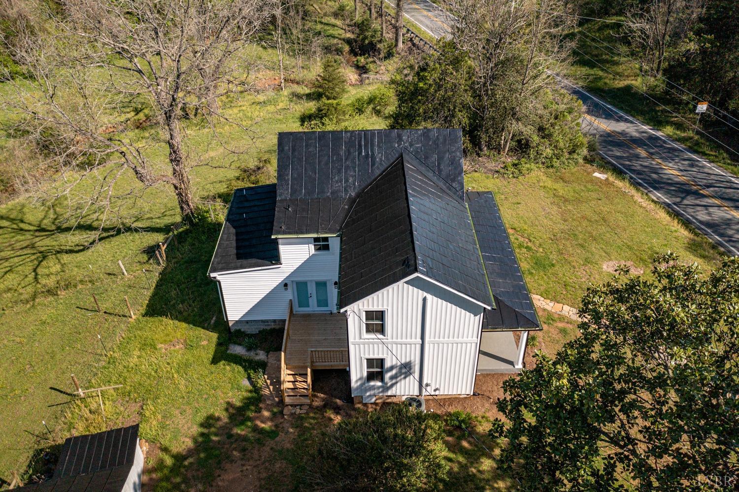 237 Lexington Turnpike Amherst, VA 24521 - Photo 16 of 56 an aerial view of a house with a yard