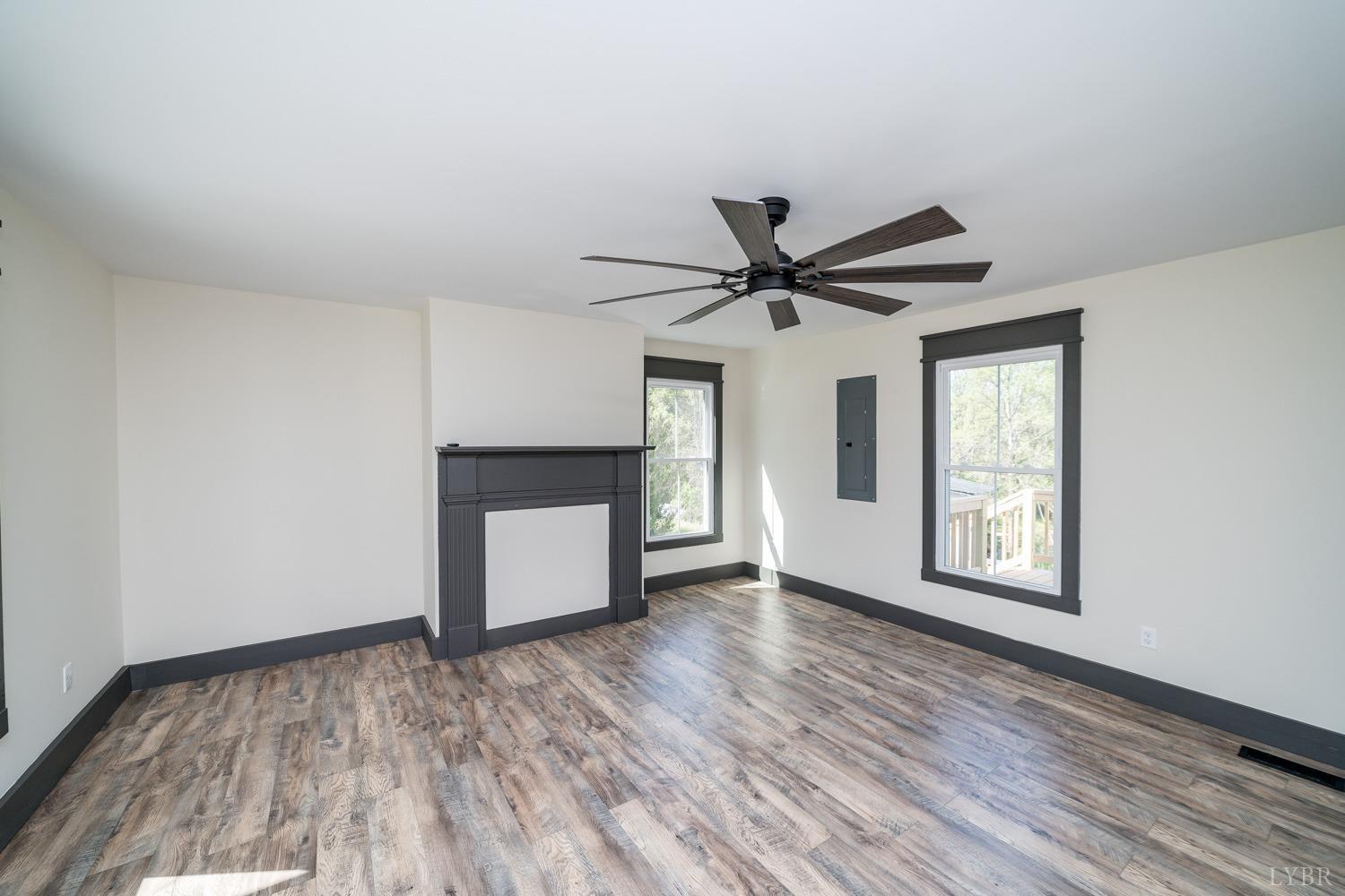 237 Lexington Turnpike Amherst, VA 24521 - Photo 24 of 56 a view of a livingroom with a ceiling fan and wooden floor