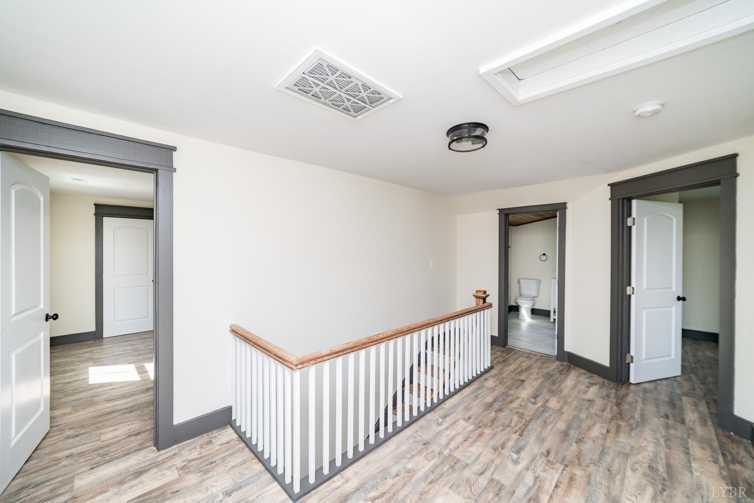 237 Lexington Turnpike Amherst, VA 24521 - Photo 46 of 56 a view of a hallway view with wooden floor and staircase