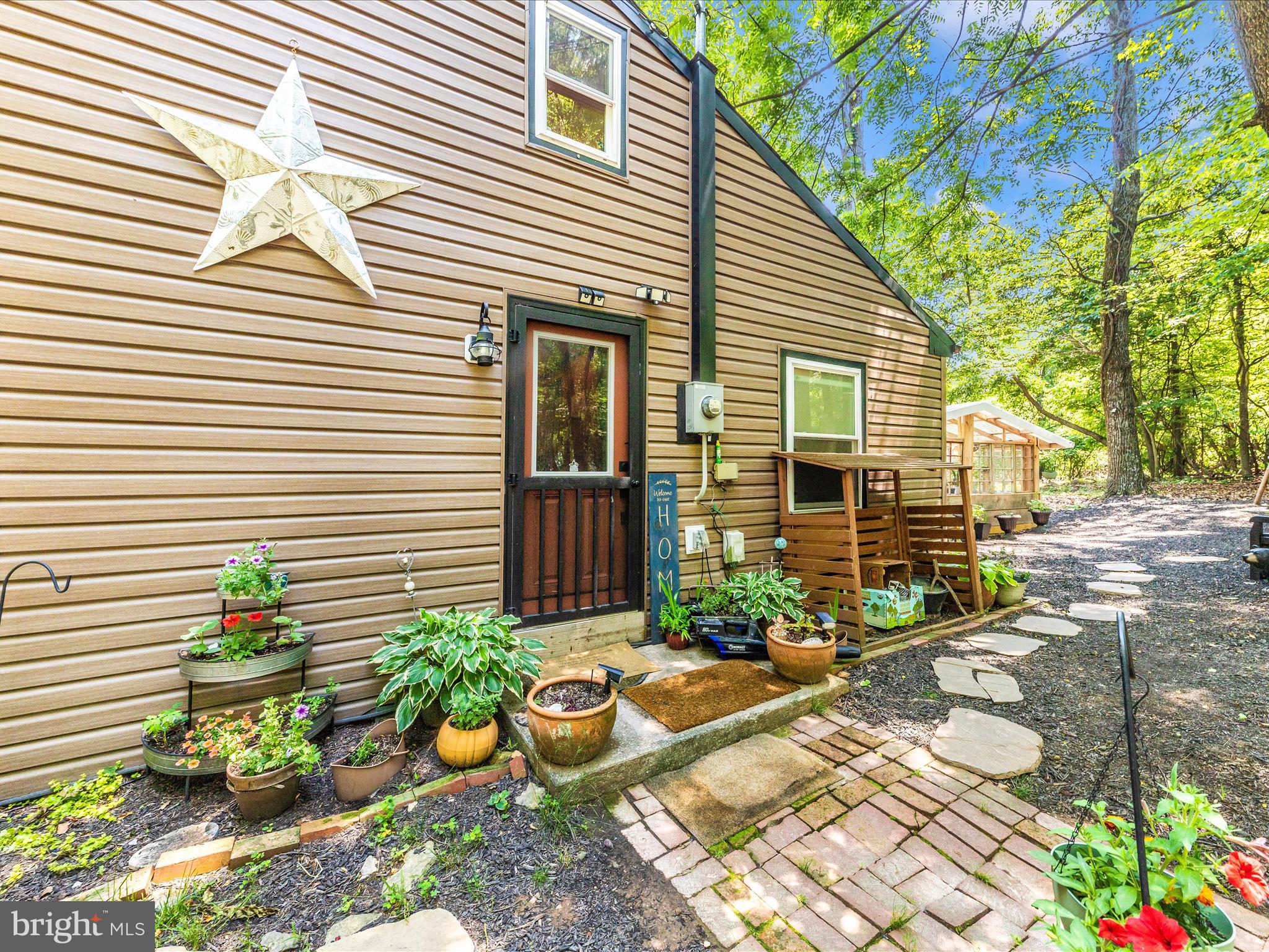 a view of a chairs and table in a patio