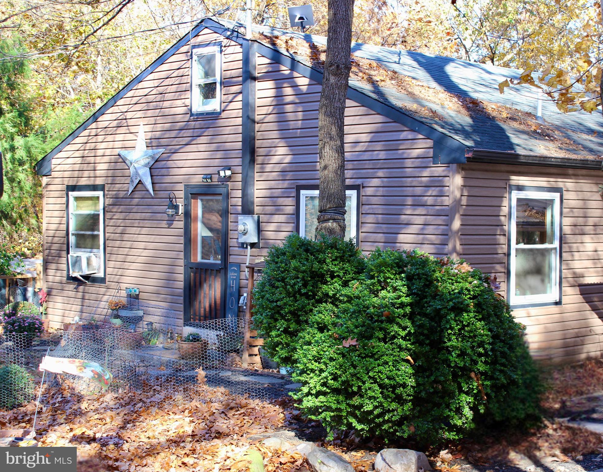 5103 Red Hill Road Keedysville, MD 21756 - Photo 2 of 78 a front view of a house with garden