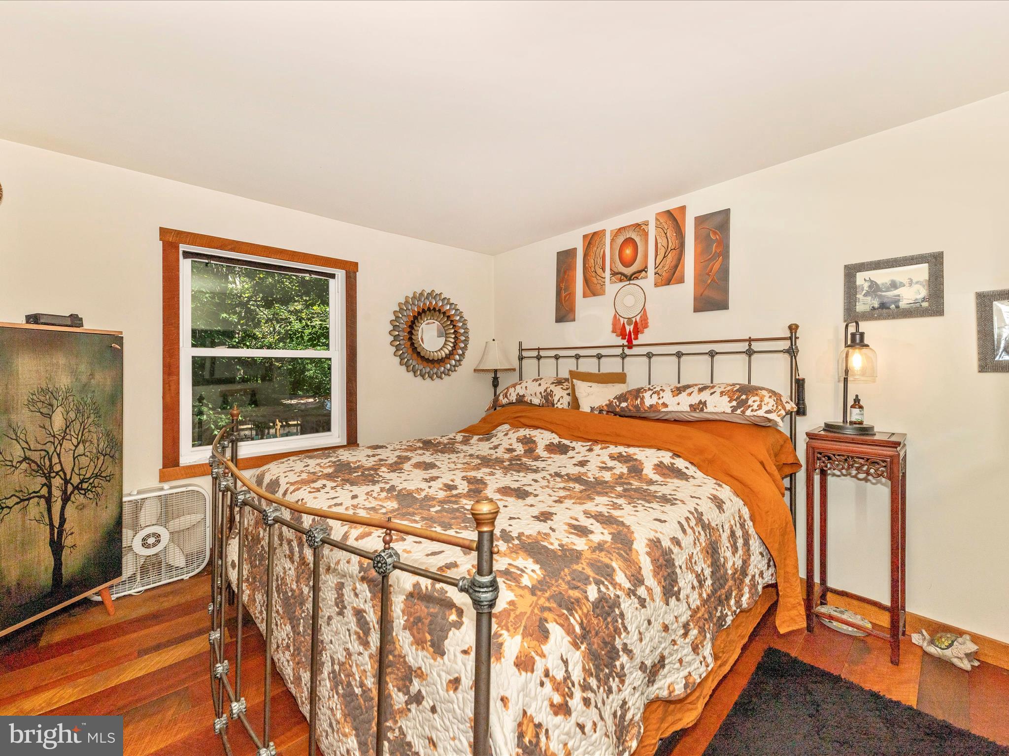 5103 Red Hill Road Keedysville, MD 21756 - Photo 30 of 78 a bed sitting in a bedroom next to a window