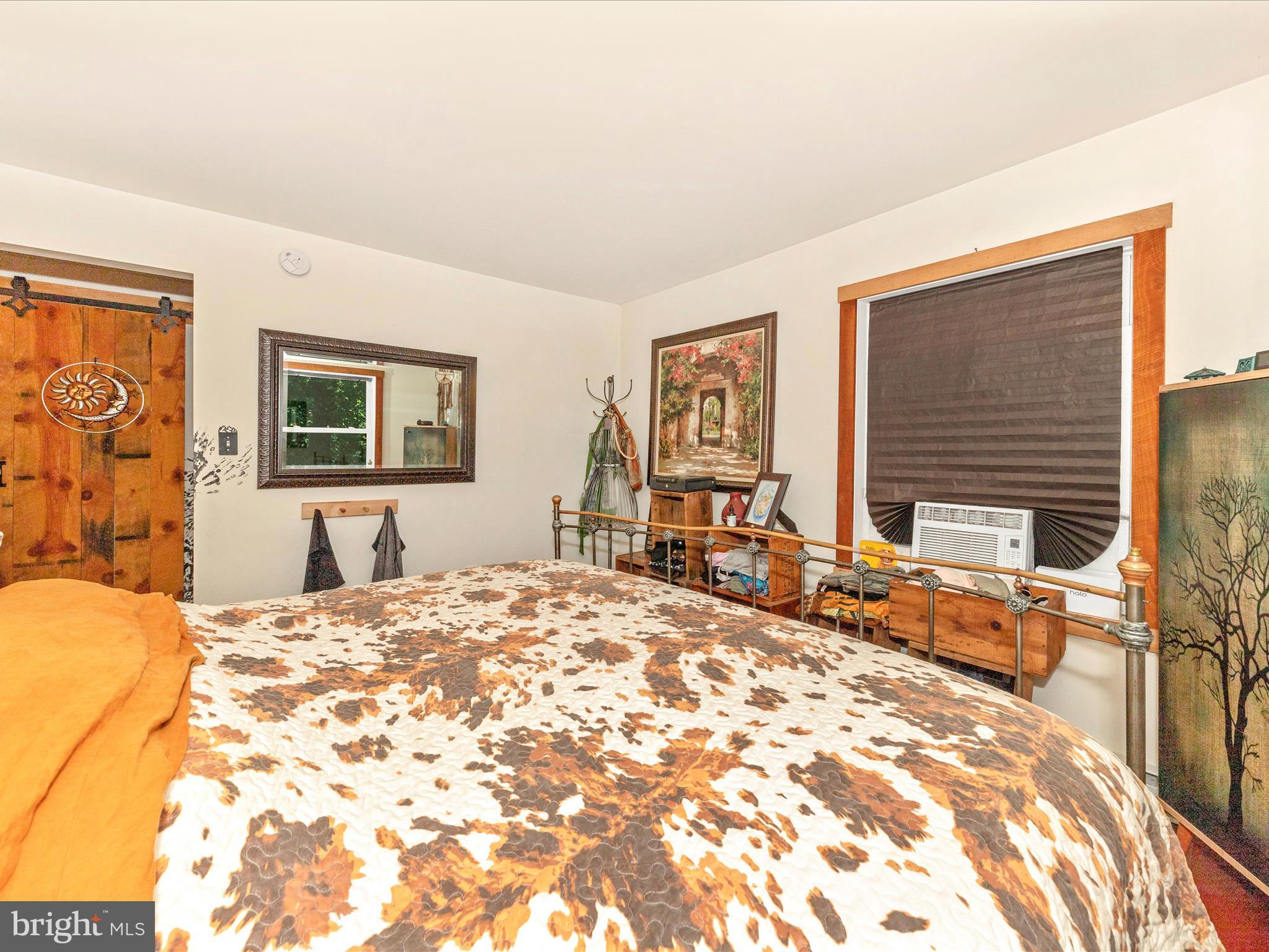 5103 Red Hill Road Keedysville, MD 21756 - Photo 33 of 78 a bedroom with a bed and wooden floor