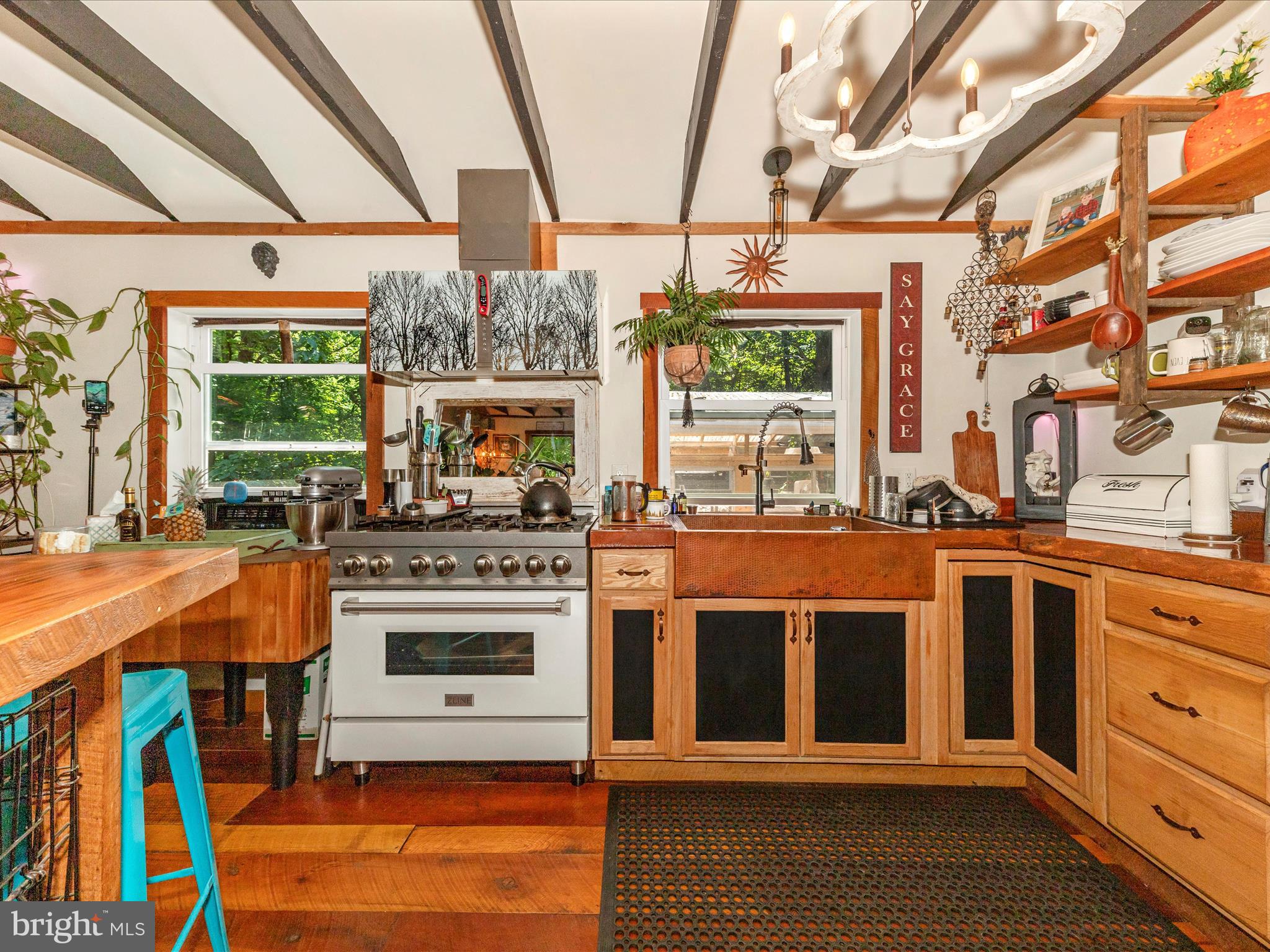 5103 Red Hill Road Keedysville, MD 21756 - Photo 40 of 78 a kitchen with stainless steel appliances granite countertop a stove and cabinets