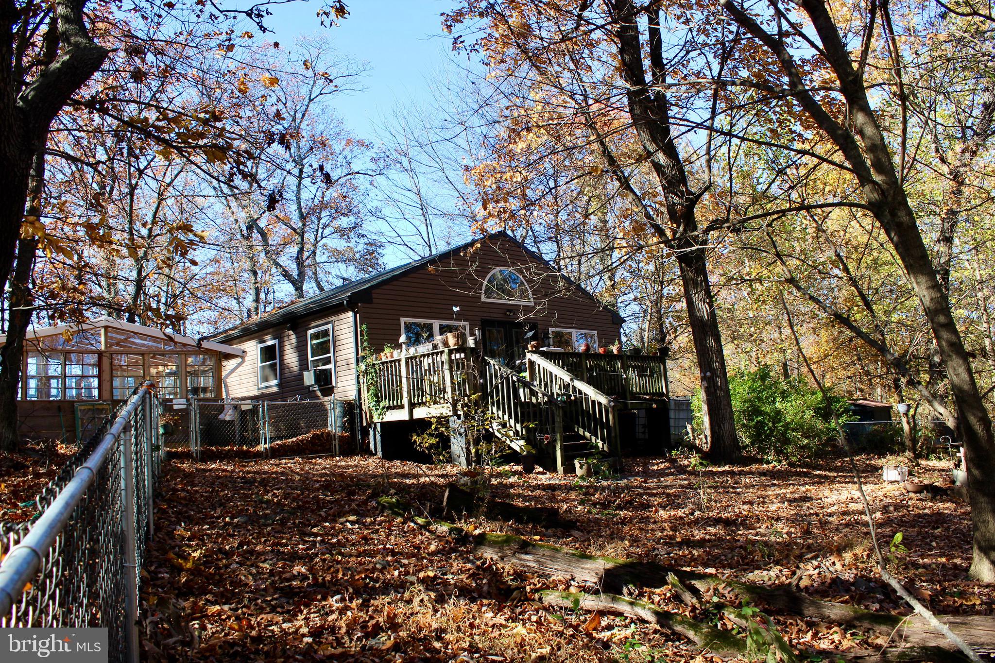 5103 Red Hill Road Keedysville, MD 21756 - Photo 5 of 78 a front view of a house with a yard