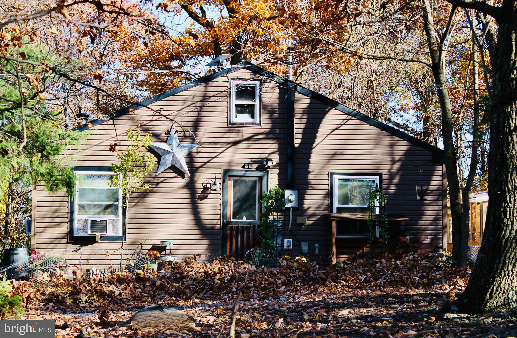 5103 Red Hill Road Keedysville, MD 21756 - Photo 6 of 78 a front view of a house with garden