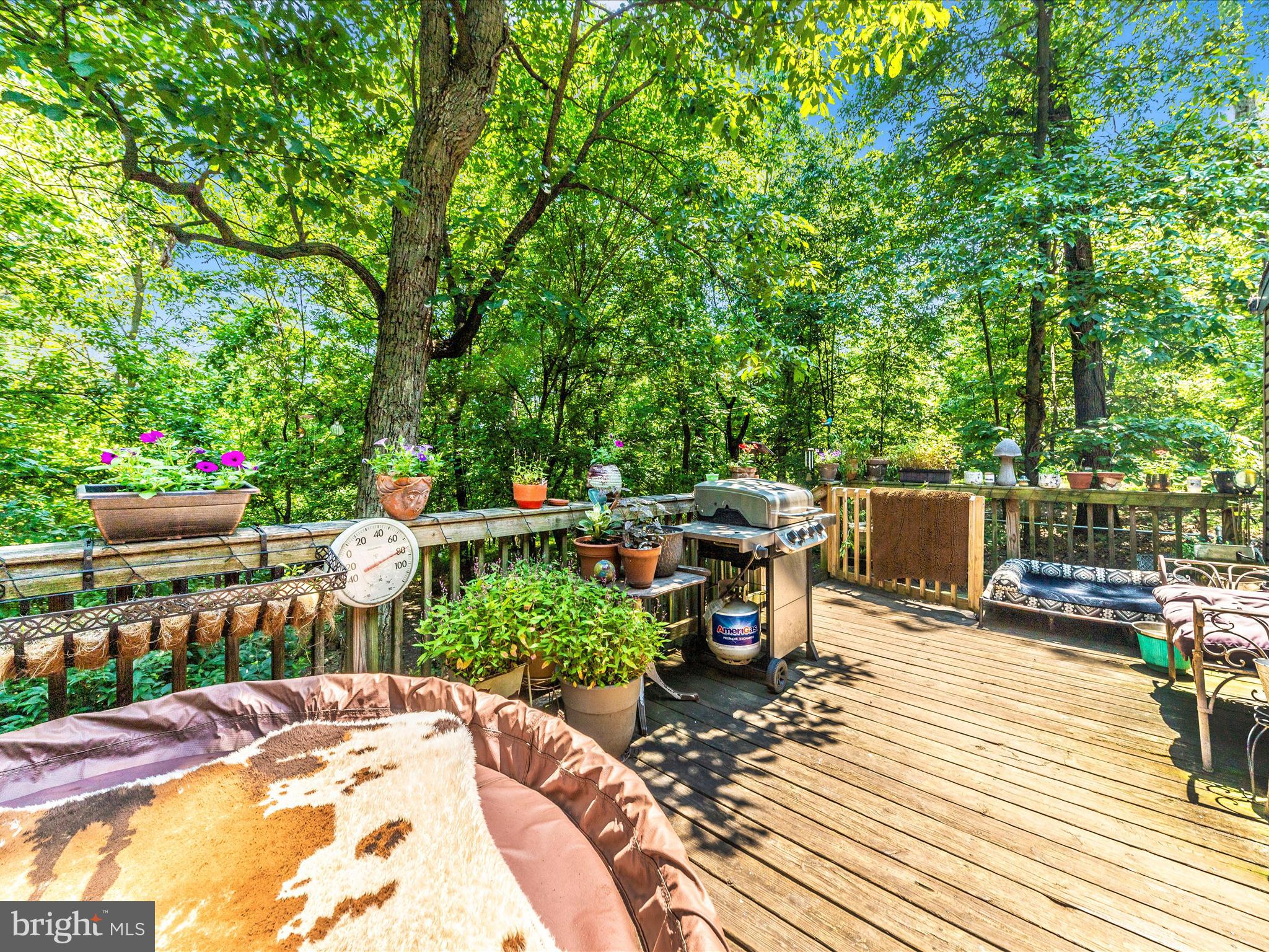 5103 Red Hill Road Keedysville, MD 21756 - Photo 72 of 78 a view of a chairs and table on the wooden deck