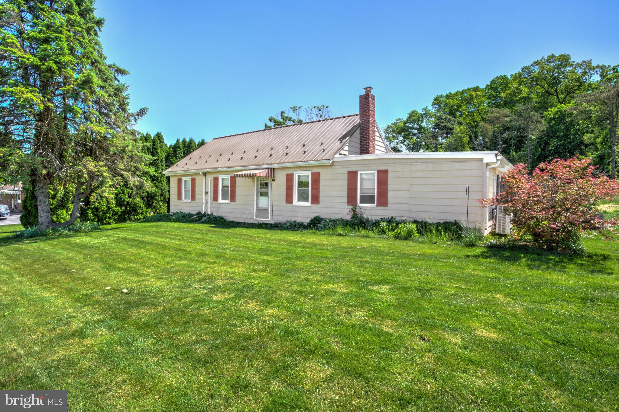 3472 Messersmith Road York, PA 17408 - Photo 3 of 41 Charming home with lush green lawn.