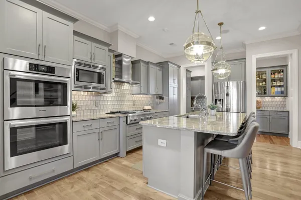 a view of a kitchen and dining room