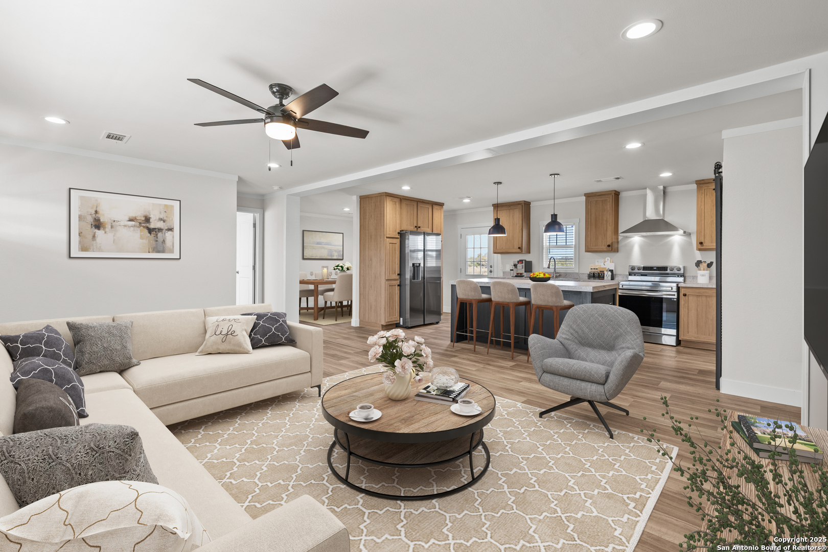 2354 Stevens Road Somerset, TX 78069 - Photo 13 of 22 a living room with furniture and a dining table